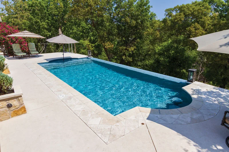 Pool with NPT QuartzScapes Caribbean Series finish, color Aruba Sky